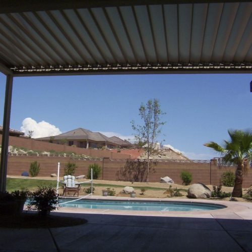 Residential patio cover in a sunny backyard 