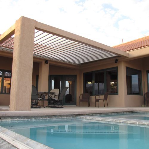A residential backyard patio shading system by Equinox