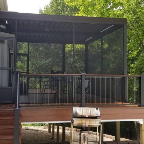 a residential patio enclosure made of faux wood by equinox
