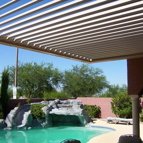 A backyard patio cover and roofing system by equinox