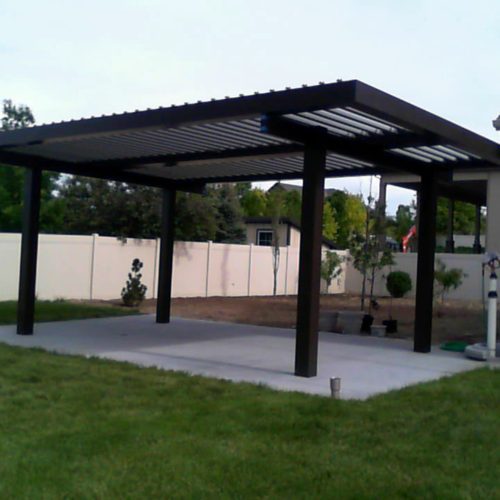 An Equinox Roofing sunshade in black, enhancing the aesthetics of outdoor spaces.
