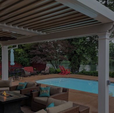 residential backyard pool with a patio covering by equinox