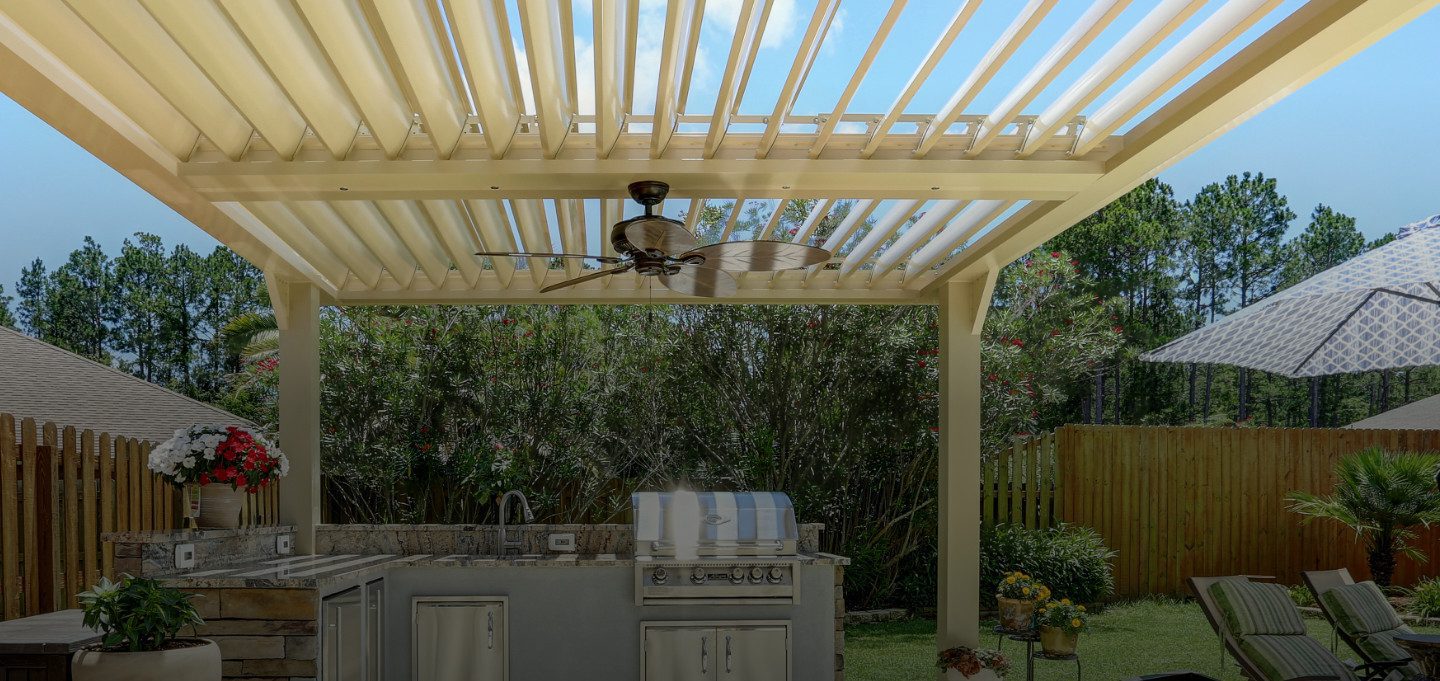 a residential patio covering with a louvered roof 