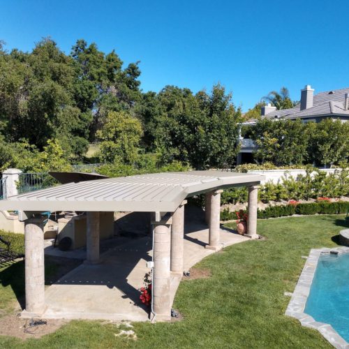 Another view of the 8 column pergola in a residential backyard. 