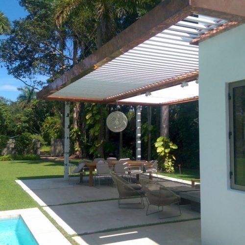 An Equinox Roofing louvered roof installed in Coral Gables, showcasing its functionality.