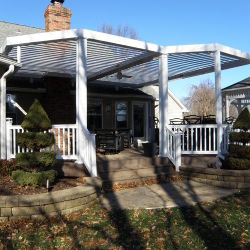 An open louvered porch covering by equinox