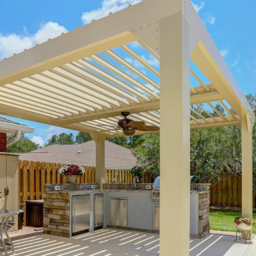 Alternative angle of Open louvers on a patio covering an outdoor kitchen