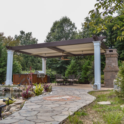 residential backyard is elevated with an equinox pergola