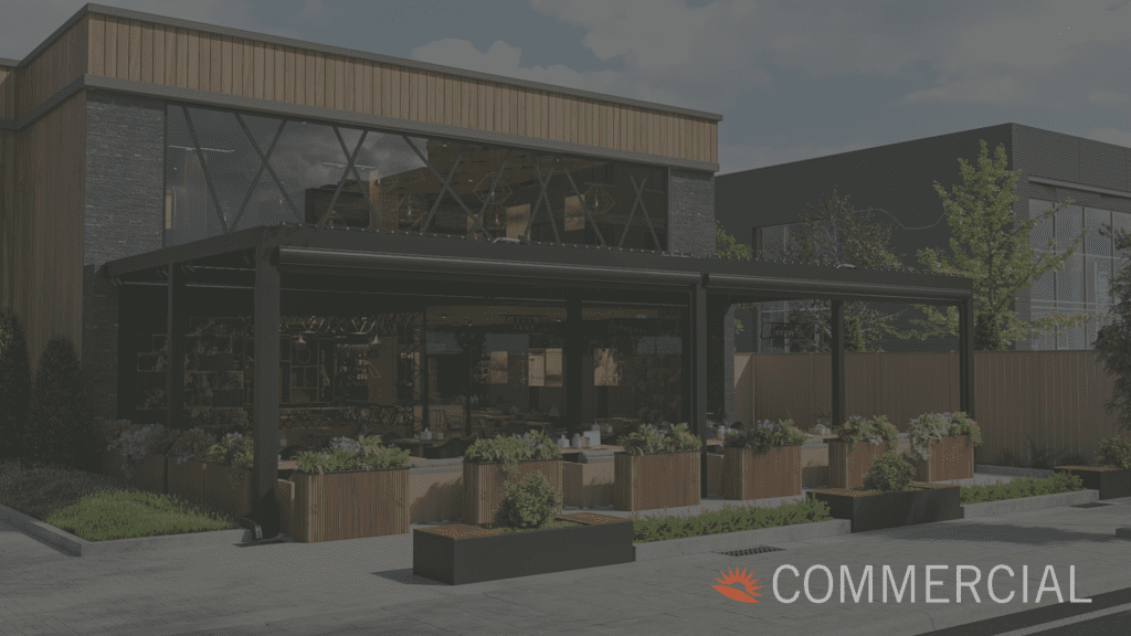 Commercial pergola attached to a space with large glass windows